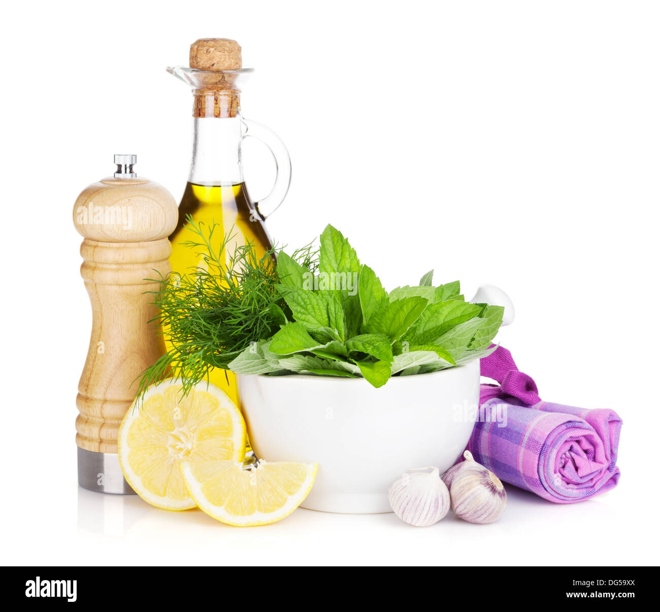 Fresh herbs, olive oil and pepper shaker. Isolated on white background Stock Photo Alamy