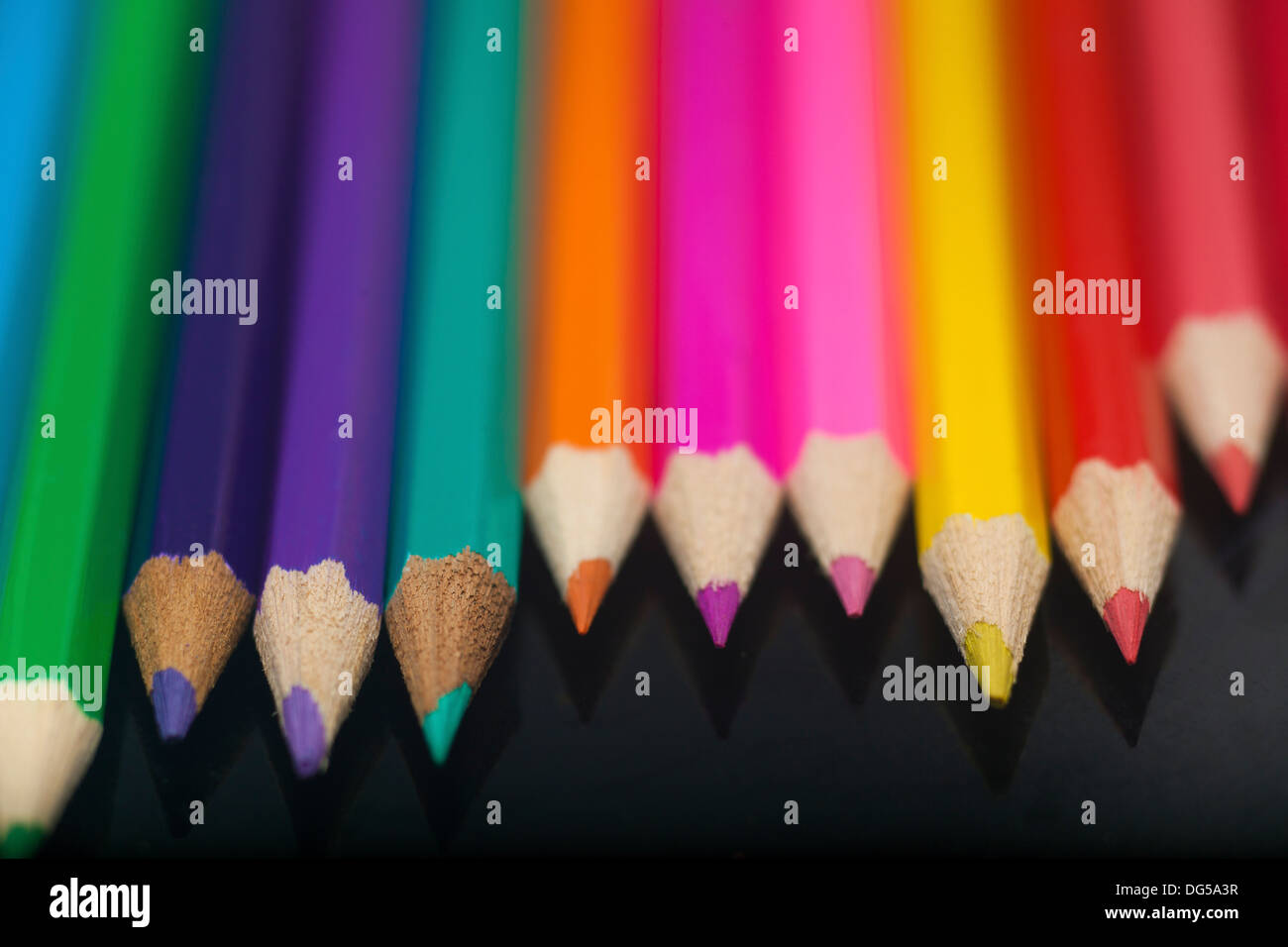 Colour pencils in black background Stock Photo