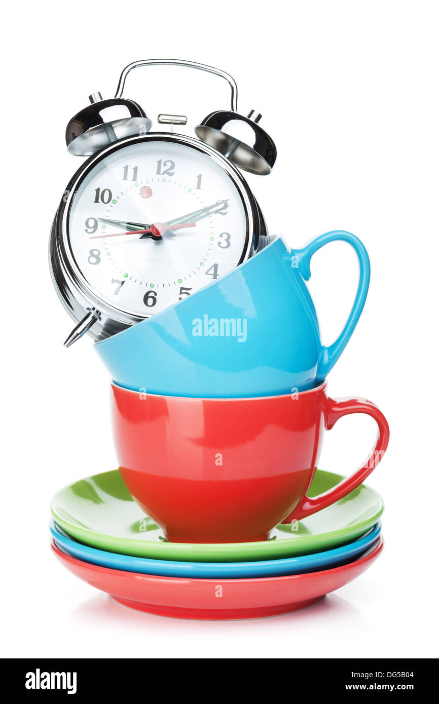 Coffee cups and alarm clock. Isolated on white background Stock Photo