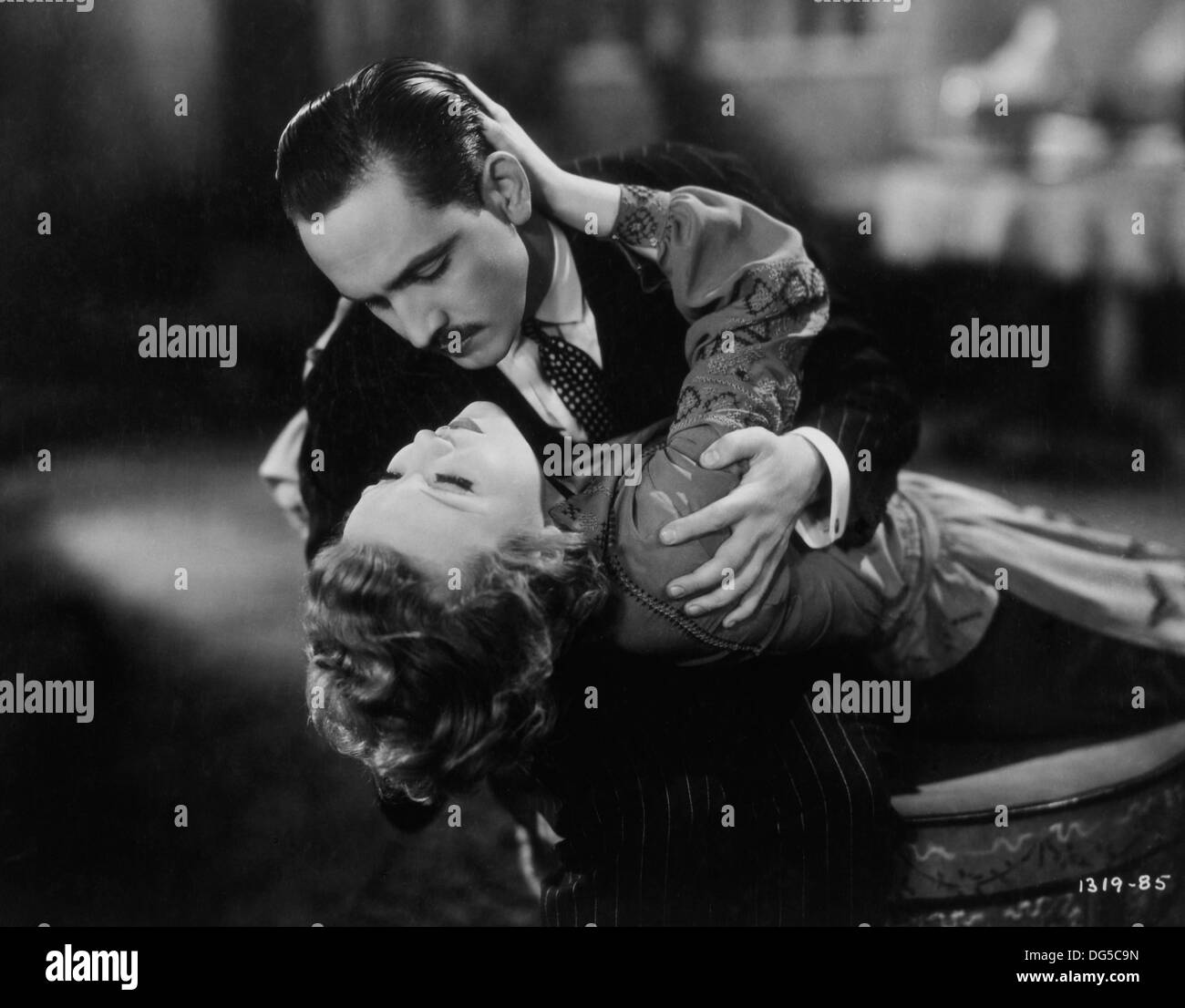 Nancy Carroll and Fredric March, on-set of the Film, 'The Night Angel', Paramount Pictures, 1931 Stock Photo