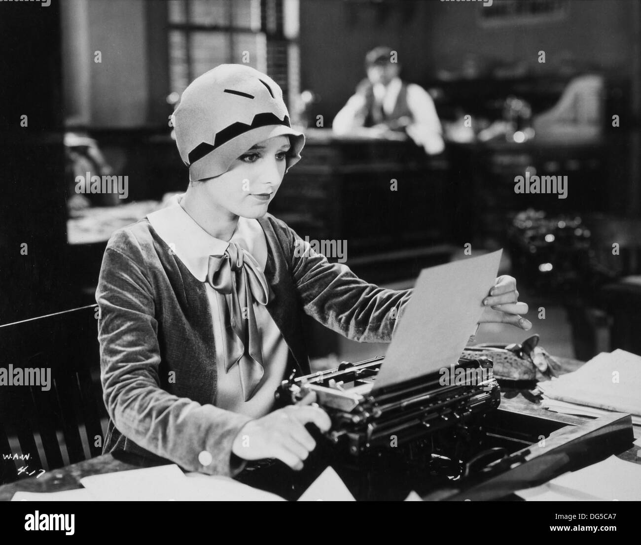 Woman Working At Typewriter by George Marks