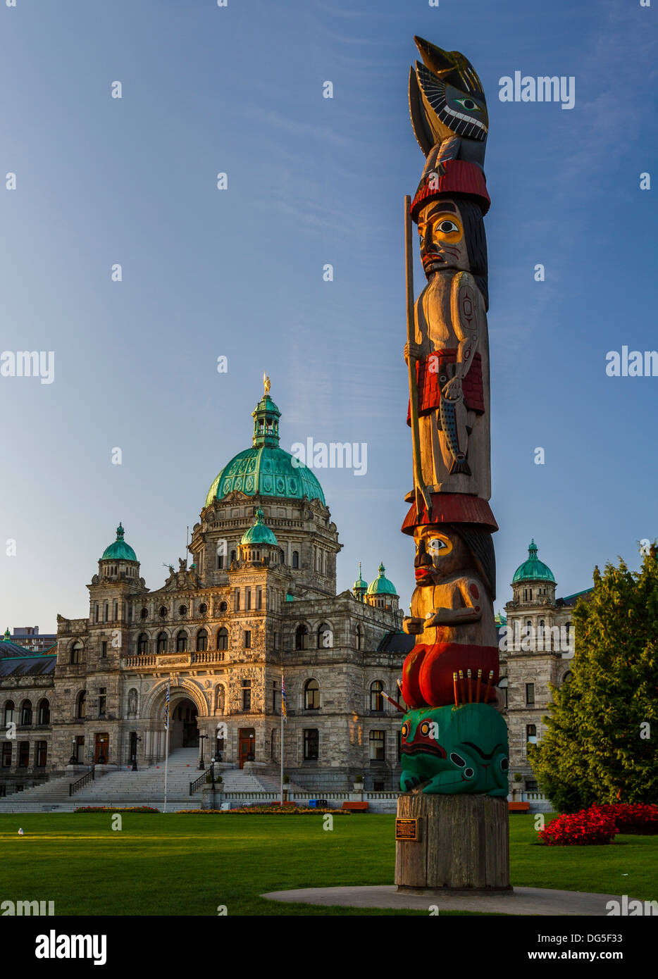 The Parliament of British Columbia in Victoria Canada with totem pole Stock Photo