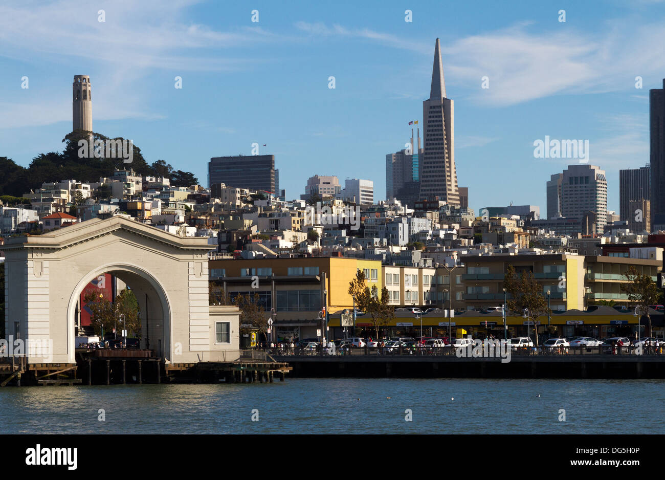 A view of the San Francisco skyline showing Coit Tower and the Transamerica pyramid as seen from the bay. Stock Photo