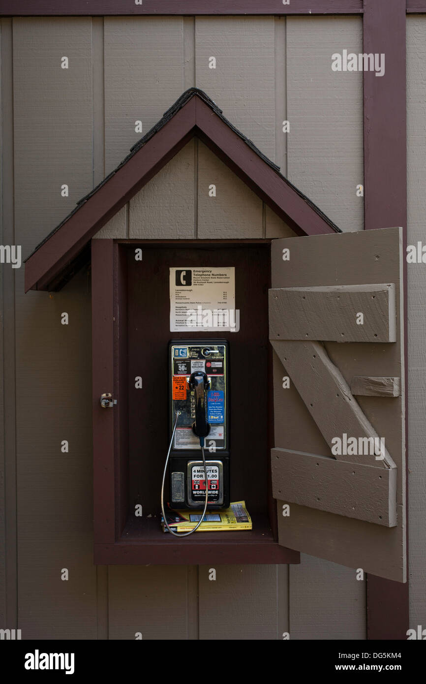 Interesting public telephone hangs outside the Visitors Center at Mount Greylock State Park in Lanesboro Massachusetts. Stock Photo