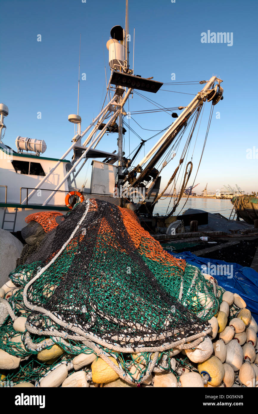 Purse Seining commercial fishing boat letting out the net in