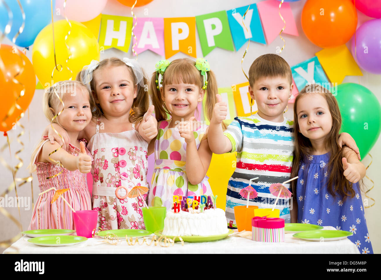 children celebrating birthday party Stock Photo