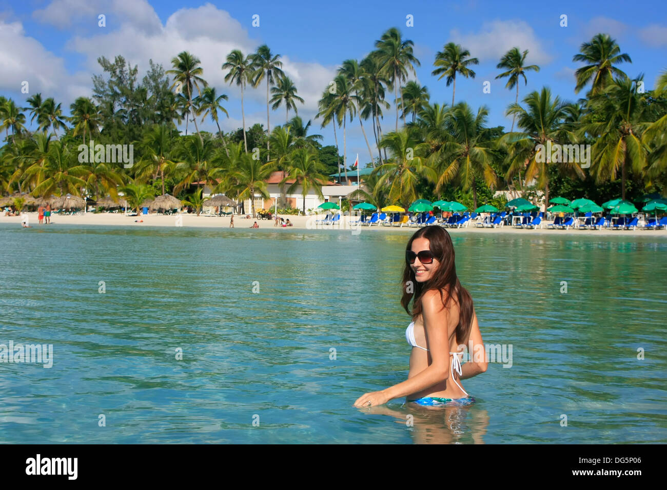 Young woman in bikini standing in clear water, Boca Chica beach, Dominican  Republic Stock Photo - Alamy