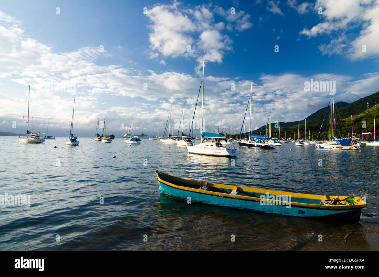 sail boats anchored out of the beach in Ilhabela, North shore of Sao Paulo state, Brazil Stock Photo