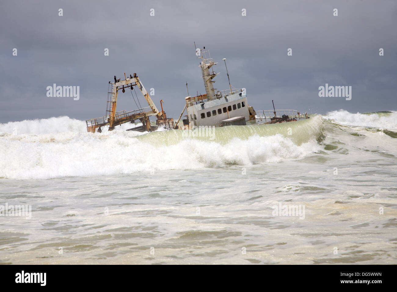 Fishing ship in danger on the beach in Swakopmund namibia Stock Photo -  Alamy