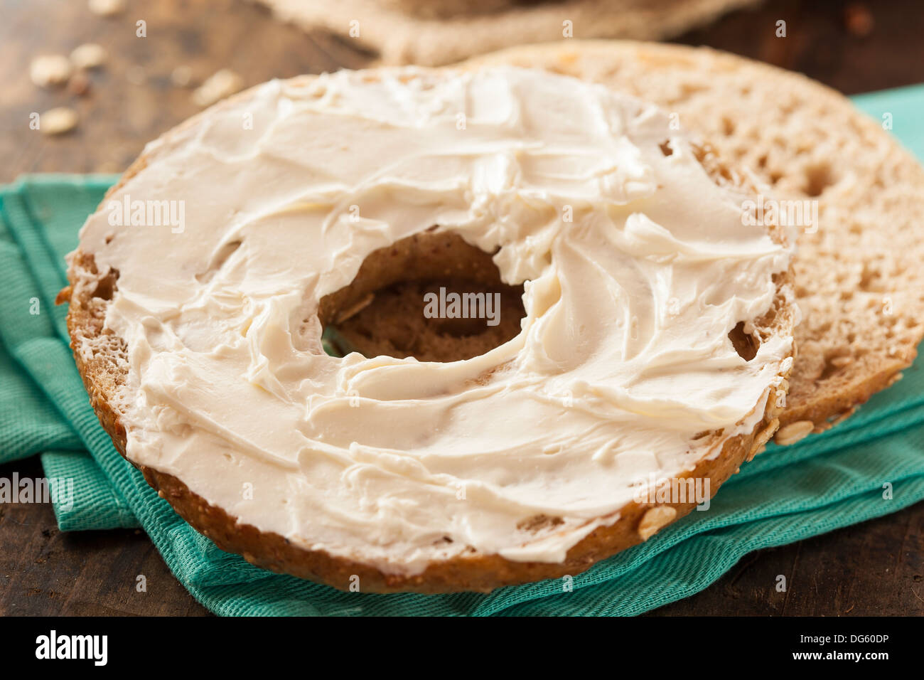Healthy Organic Whole Grain Bagel with Cream Cheese Stock Photo Alamy