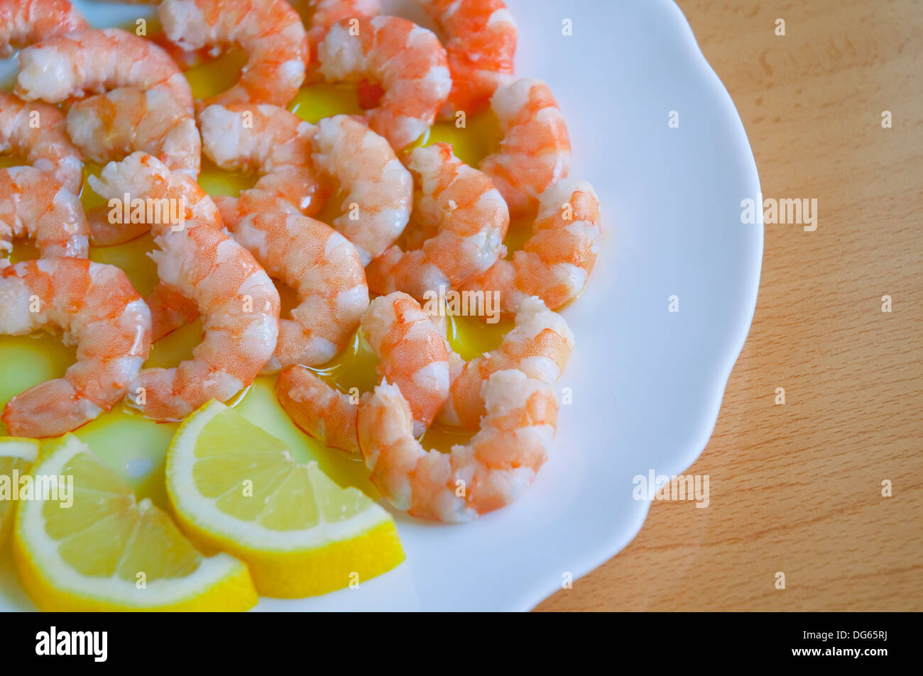 Shelled prawns with olive oil and lemon. Spain Stock Photo Alamy