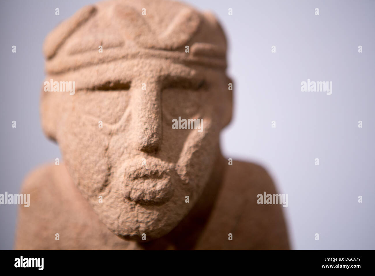 Detail of the head of a Mayan sculpture found in Costa Rica. Ancient Maya art refers to the material arts of the Maya civilizati Stock Photo