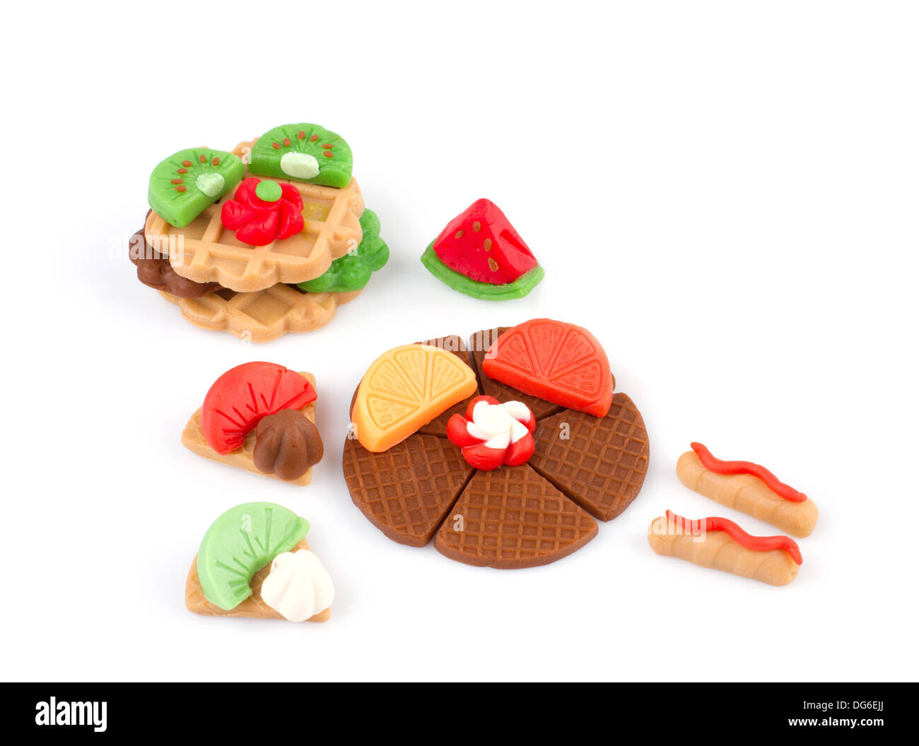 plasticine waffle and fruits display on white background Stock Photo