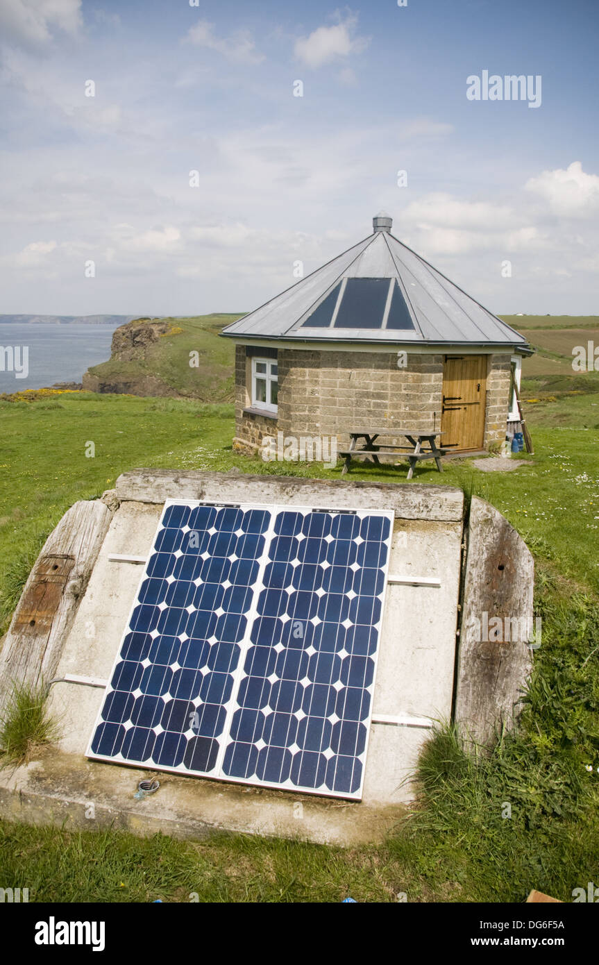 Solar panels converting sunshine into electricity for a small round