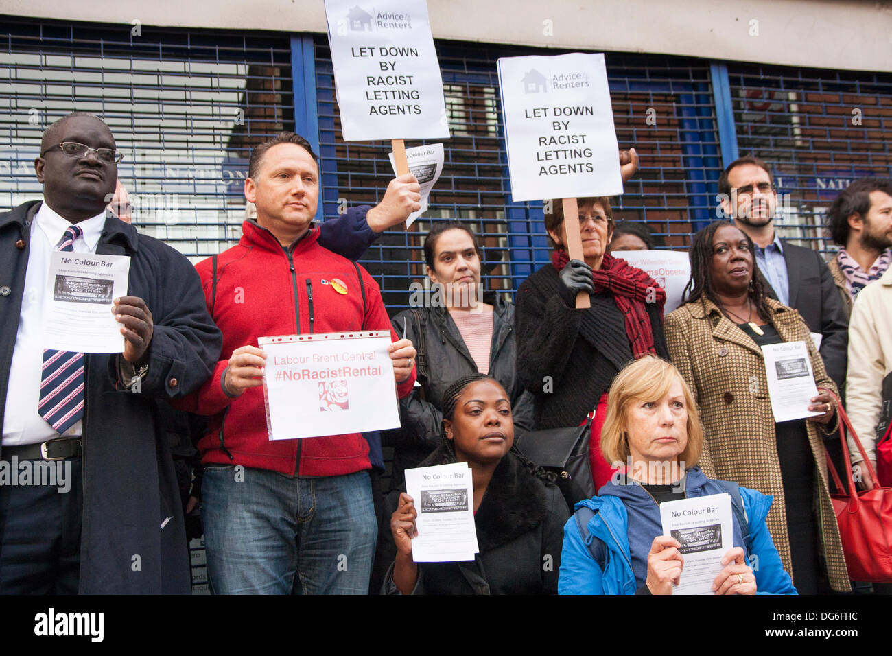 London, UK. 15th October 2013. Anti-racism campaigners demonstrate outside estate agents in Willesden Green, North London, against lettings agents found to have denied rental properties to Afro-Caribbean homeseekers. Credit:  Paul Davey/Alamy Live News Stock Photo