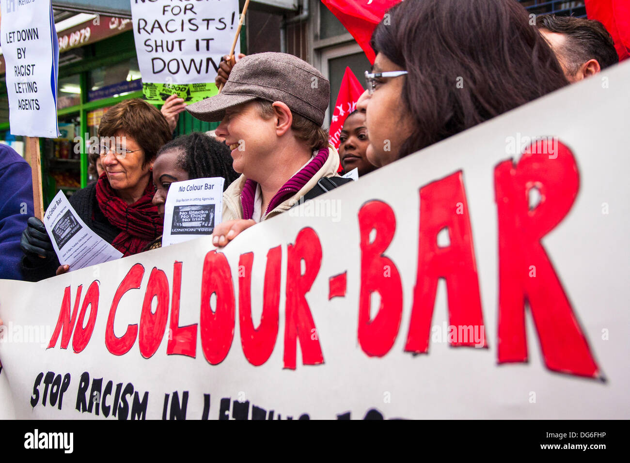 London, UK. 15th October 2013. Anti-racism campaigners demonstrate outside National Estate Agents in Willesden Green, North London, who have been found to have denied rental properties to Afro-Caribbean homeseekers. Credit:  Paul Davey/Alamy Live News Stock Photo