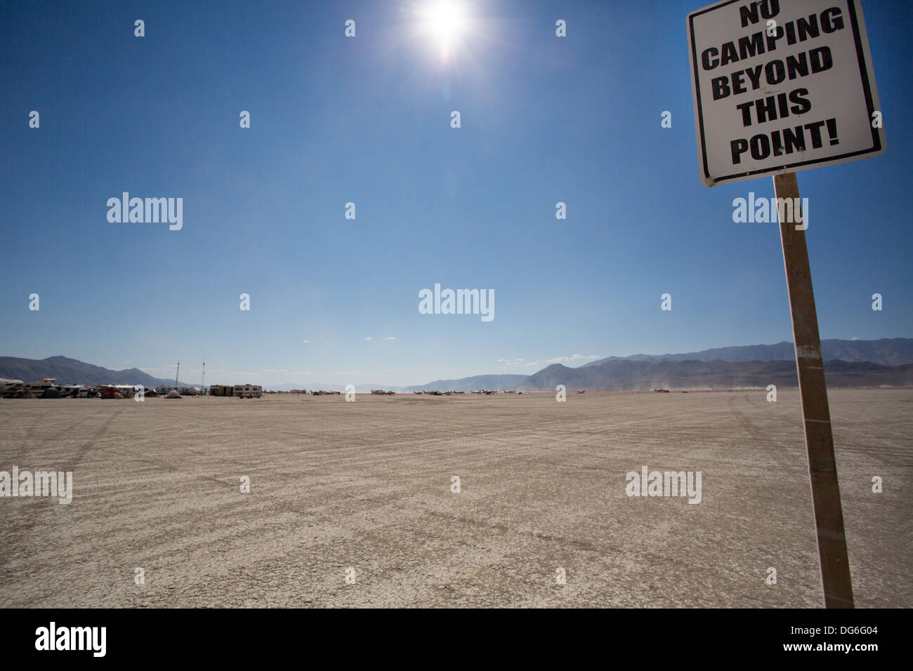 No camping Sign on the Black Rock Desert during the Burning Man Festival 2013 Stock Photo