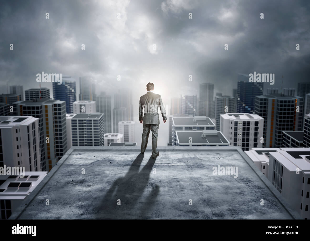 A businessman watching over the city. Stock Photo