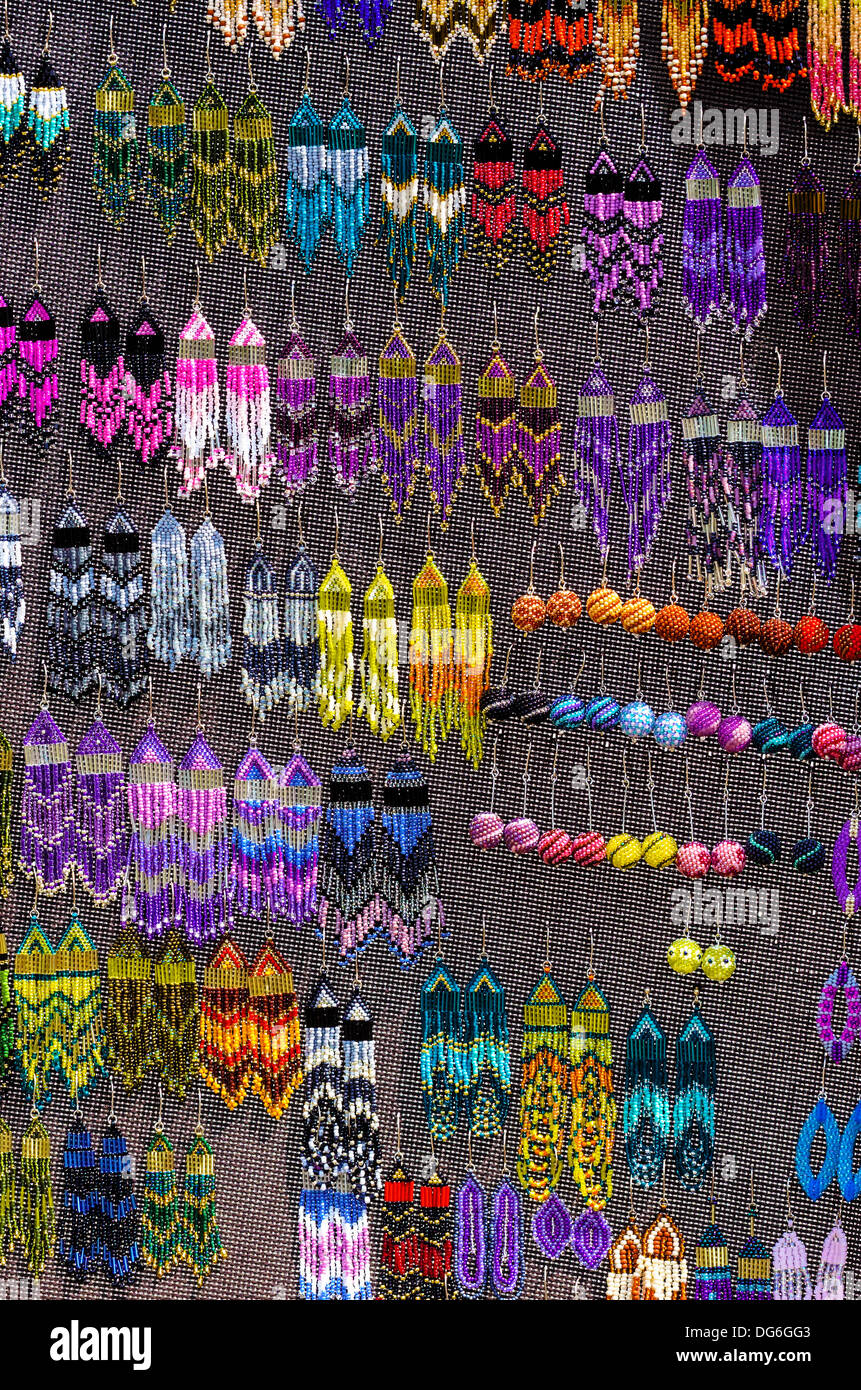 Colourful handmade earrings on a market stall Stock Photo Alamy