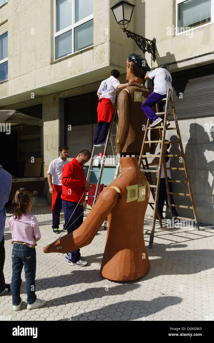 Assembling 'dancing giant' figure for Basque/Spanish fiesta in San Sebastian. Stock Photo