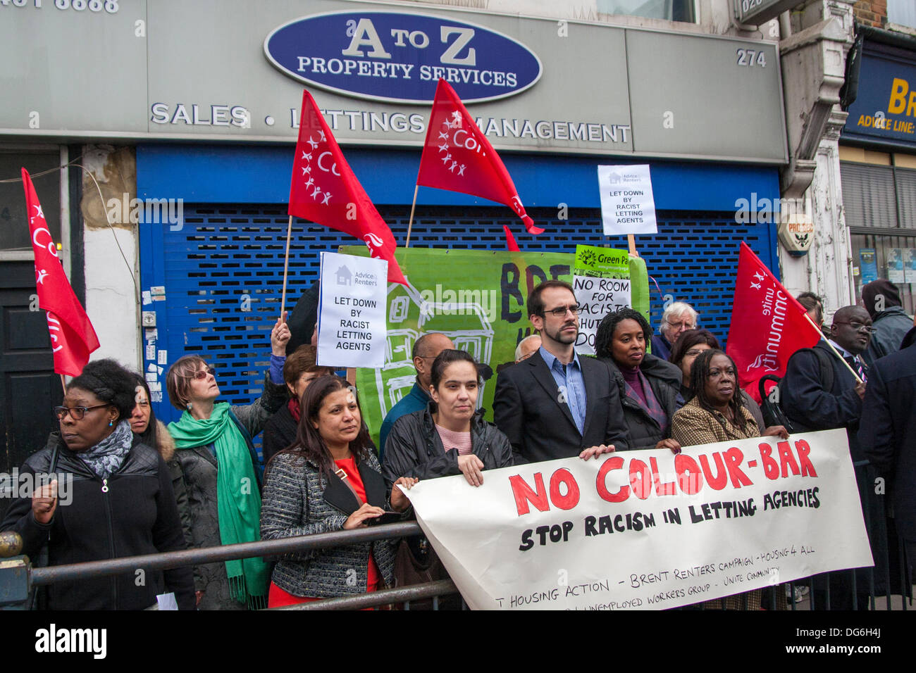 London, UK. 15th October 2013. Anti-racism campaigners demonstrate outside A to Z Property Services in Willesden Green, North London, after the lettings agents were found to have denied rental properties to Afro-Caribbean homeseekers. Credit:  Paul Davey/Alamy Live News Stock Photo