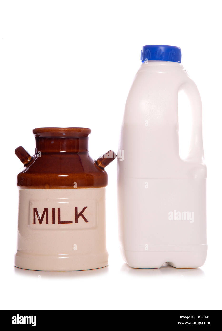 Milk jug and pint studio cutout Stock Photo