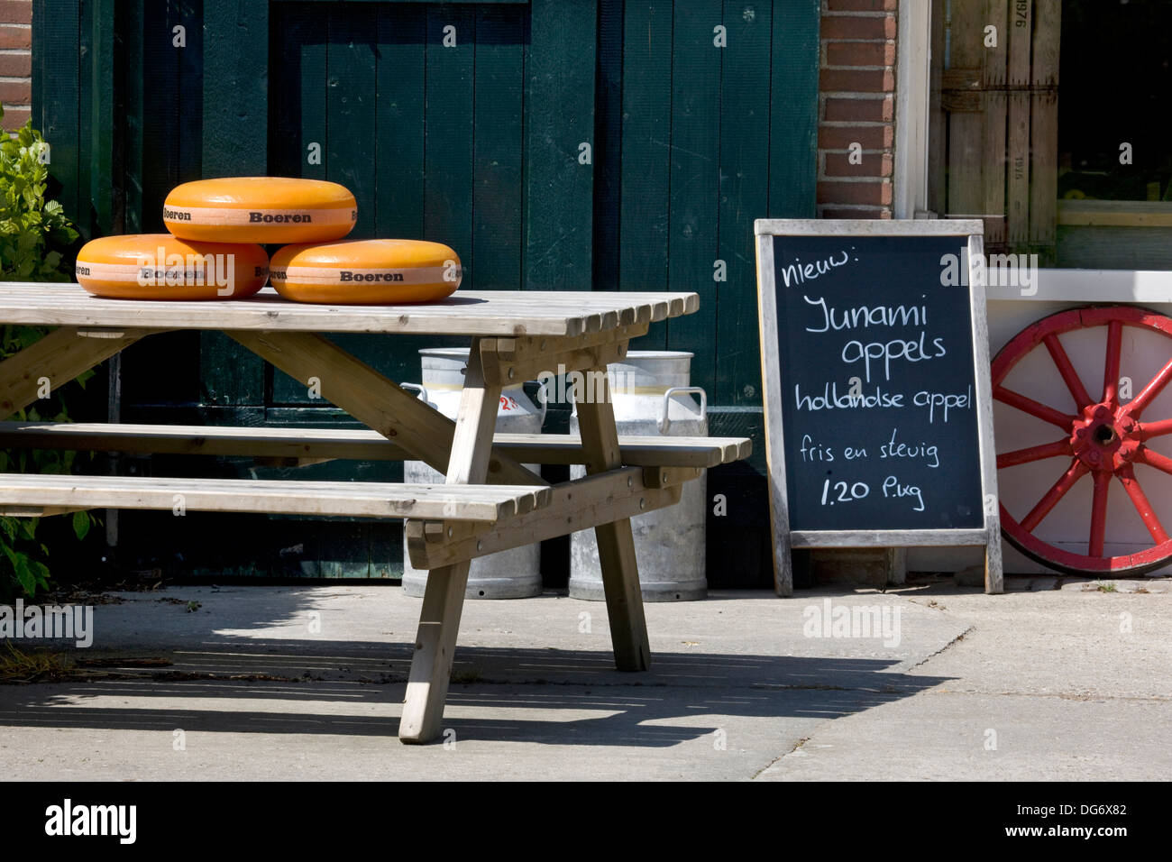 Cheese and dairy products for sale outside in front of farm in Holland, the Netherlands Stock Photo