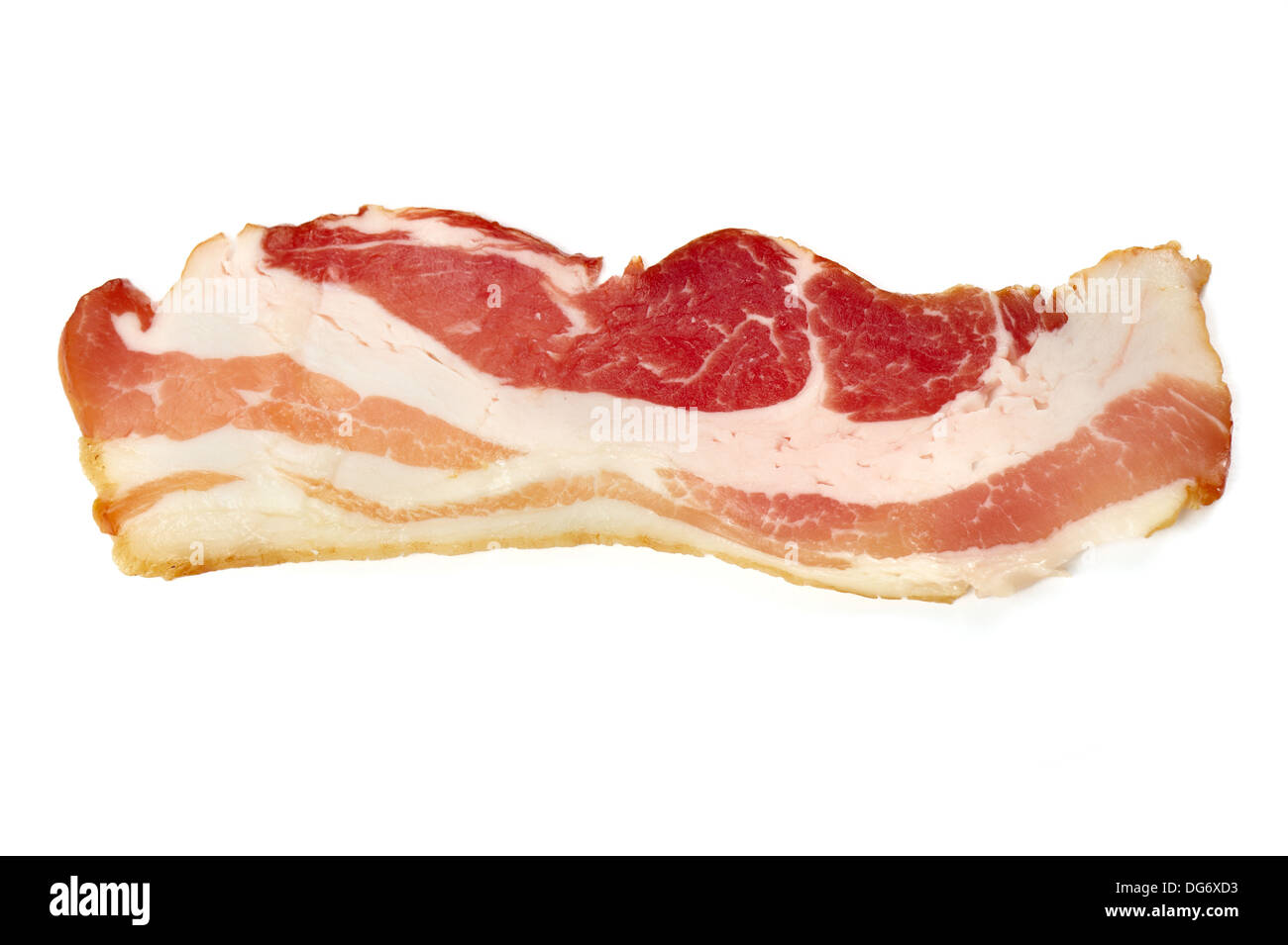 One strip of bacon isolated on a white background. Tasty looking but unhealthy food. Stock Photo