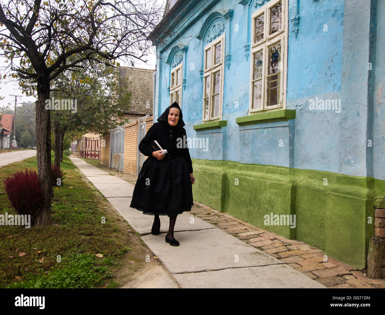 Old woman on the street hi-res stock photography and images - Alamy