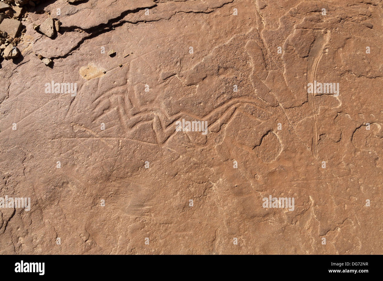Prehistoric rock carvings at Aman Ighribin on the Tata to Akka road in Morocco Stock Photo