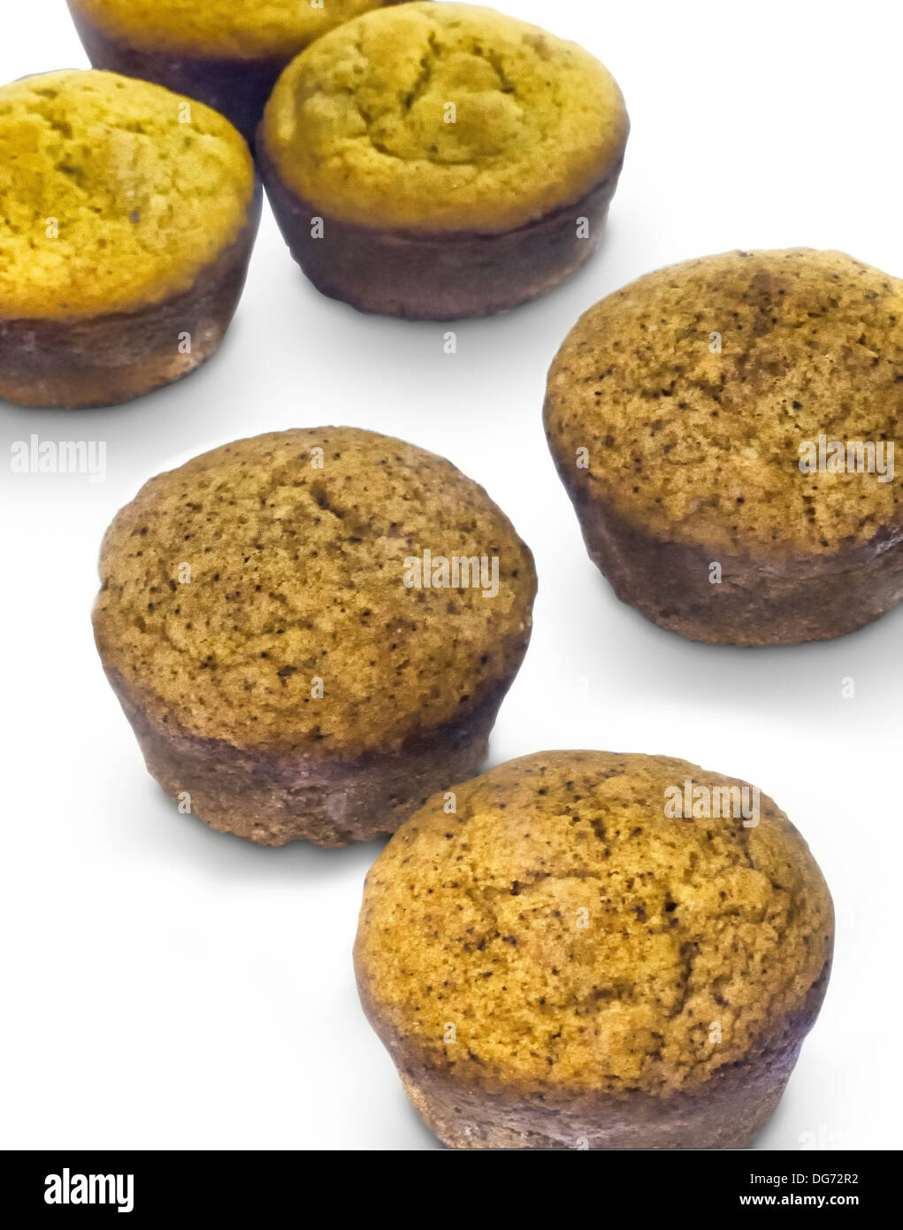 Banana and corn muffins on a white background. Vertical page format. Stock Photo