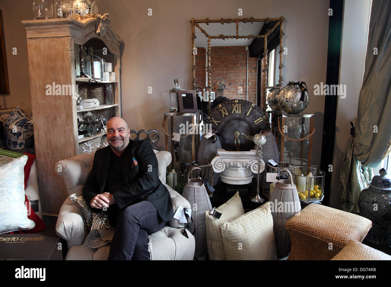 Interior designer Ian Thompson in his Lisburn Road shop, Belfast, Northern Ireland UK Stock Photo