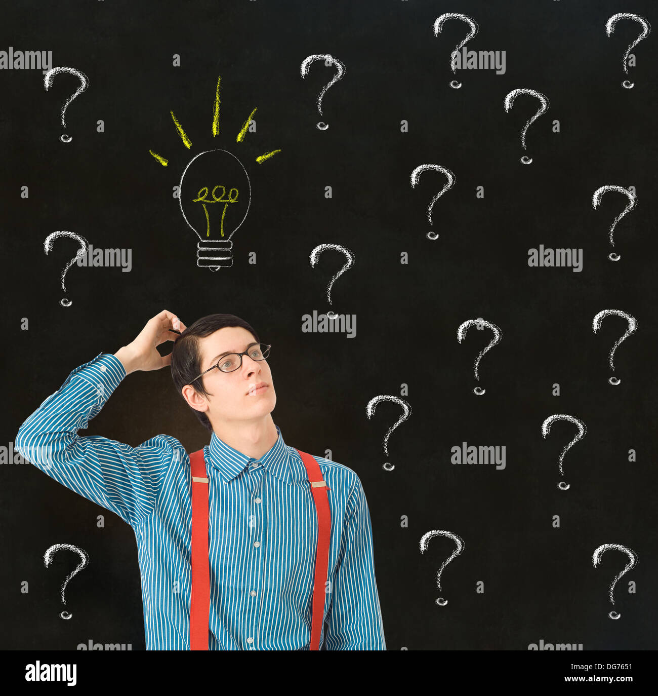 Thinking businessman scratching head with chalk questions marks and