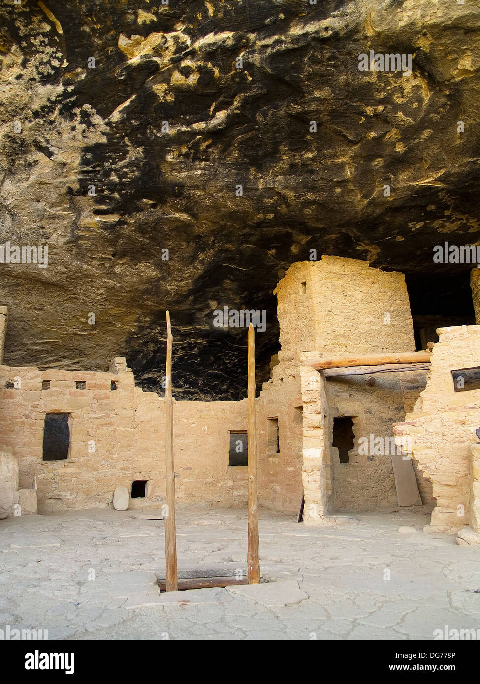 A wood ladder leading down to a kiva at the Spruce Tree House,Mesa Verde National Park,Colorado Stock Photo