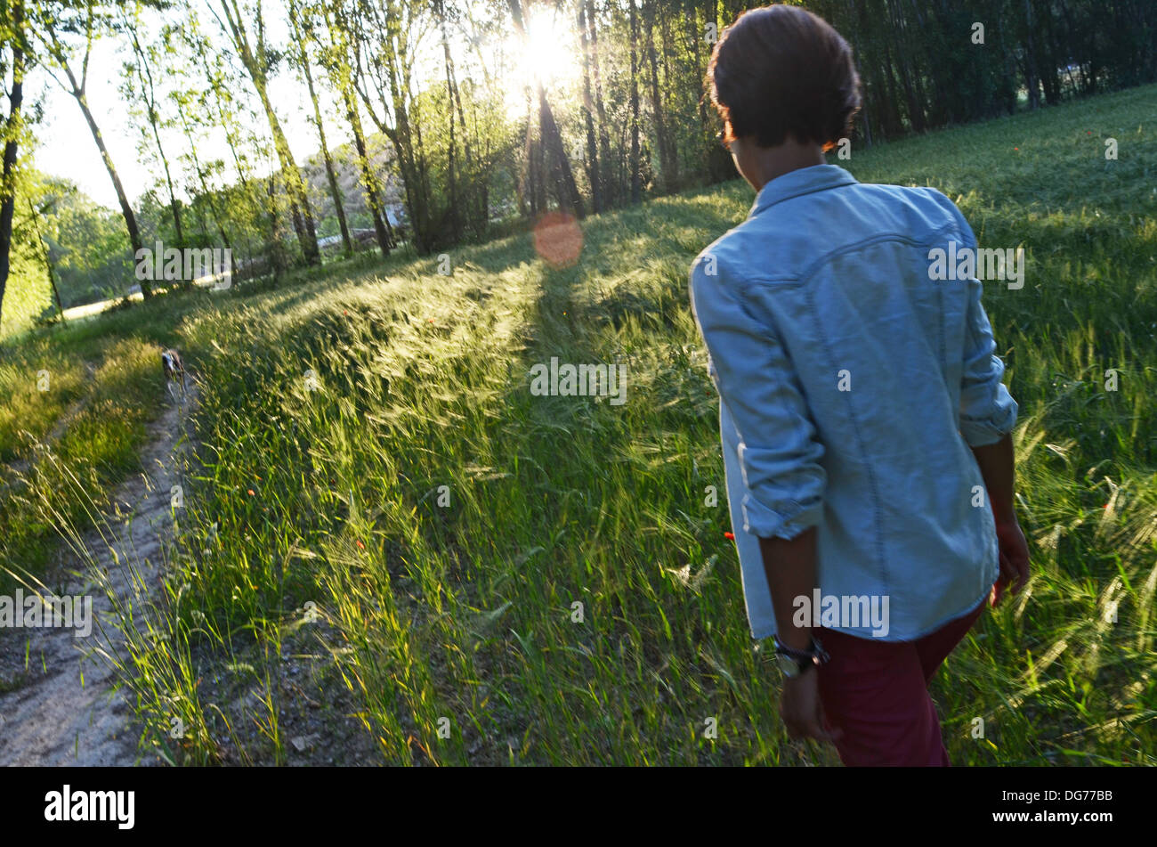 Young attractive woman takes a walk in nature Stock Photo - Alamy