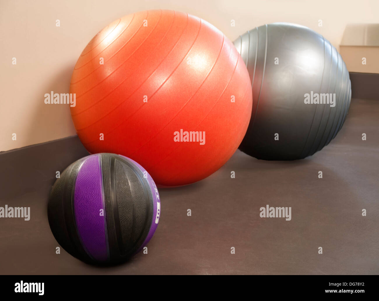 Two Fitballs and ball in the gym Stock Photo Alamy