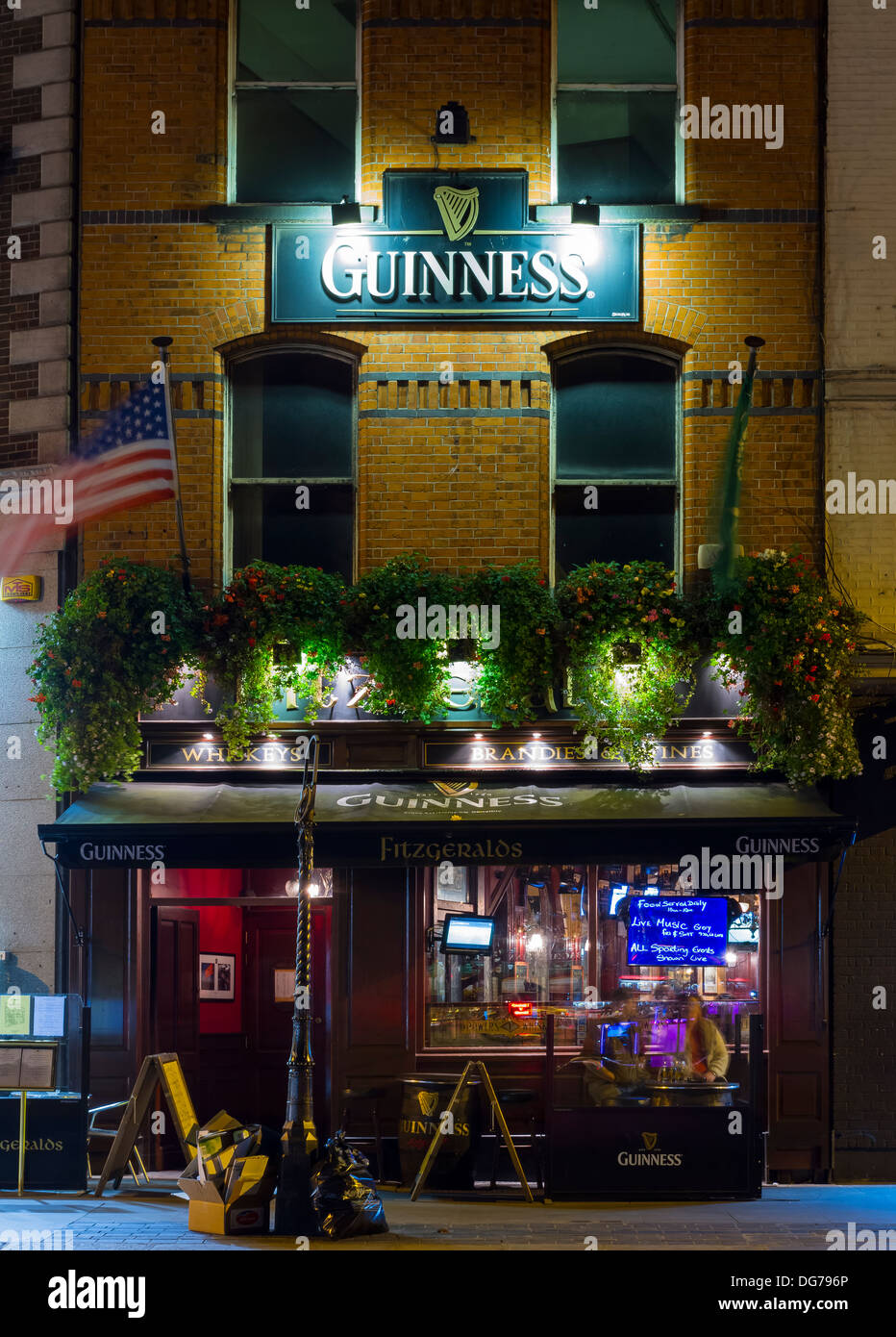 Dublin, Ireland - October 14, 2013: A view of a traditional Irish pub Fitzgeralds in Dublin center serving the famous Guinness Stock Photo