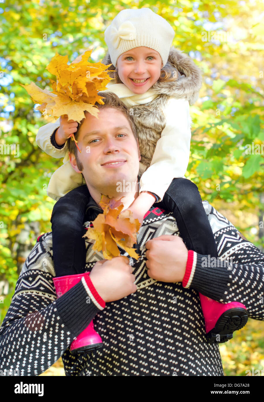 Happy father and daughter having fun in the park Stock Photo - Alamy