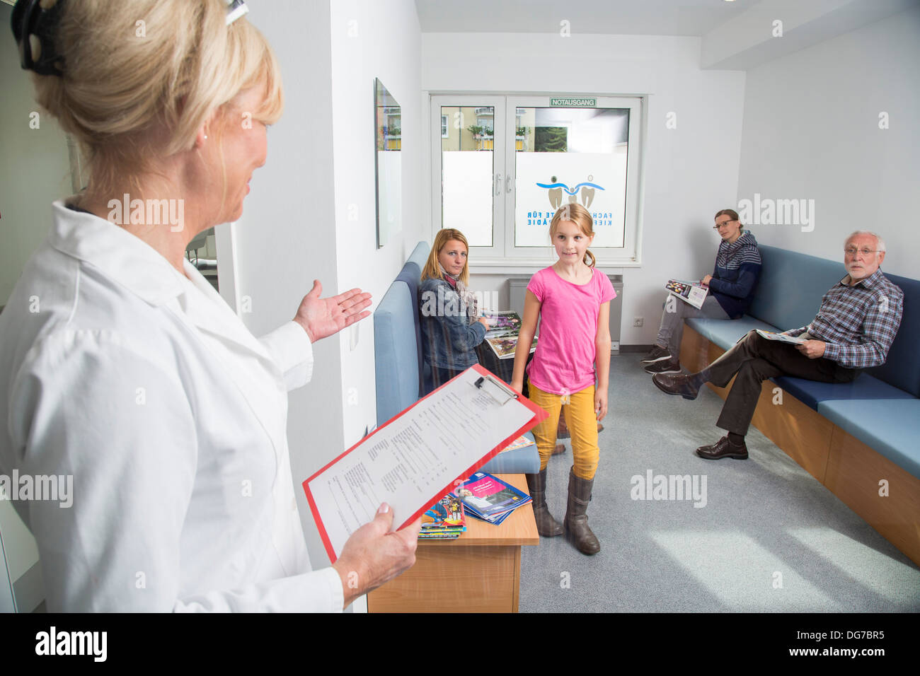 Dental practice, patients in the waiting room. Stock Photo