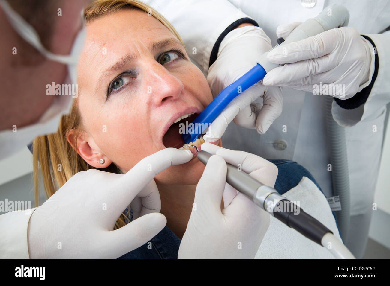 Dental practice, dentistry. Woman at a dentist treatment. Stock Photo
