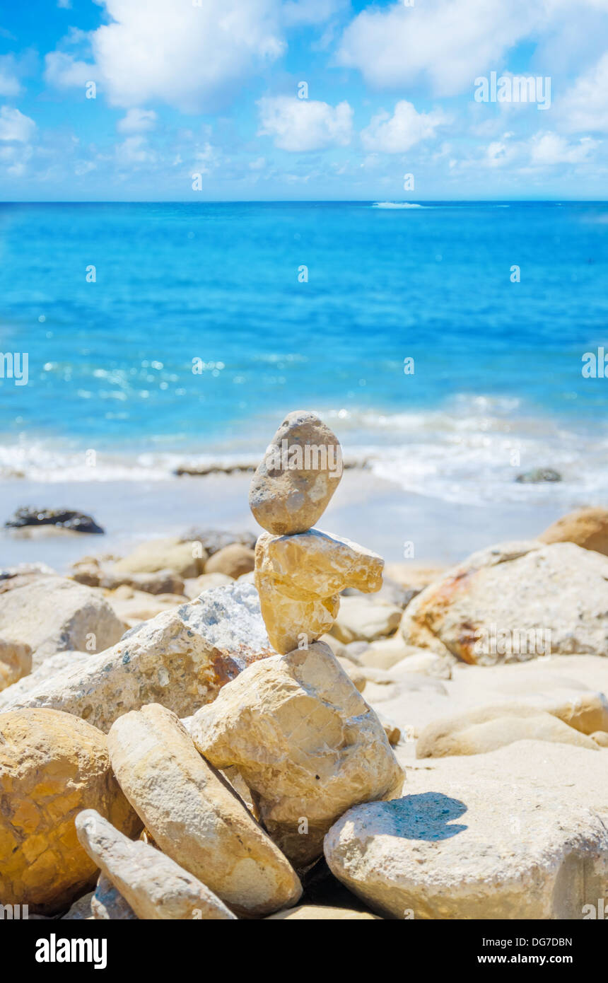 Stack of sea rocks balancing by Pacific ocean Stock Photo - Alamy