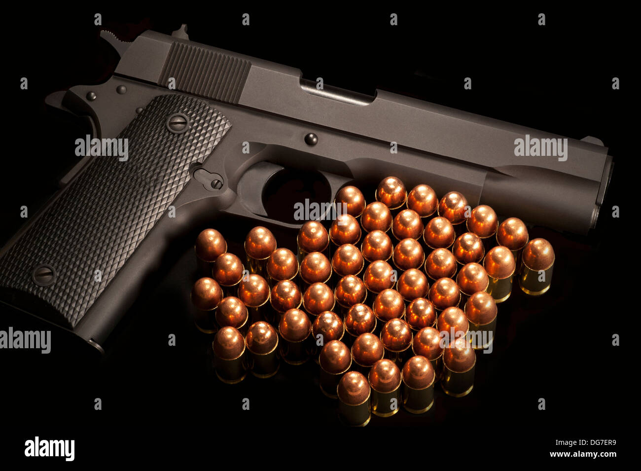 Gun and cartridges Stock Photo