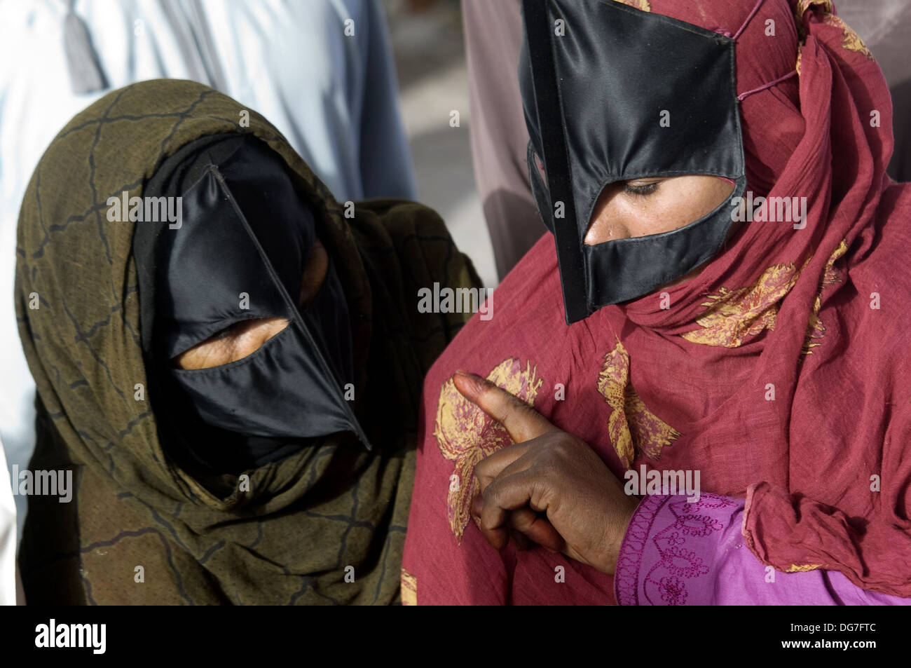 Women wearing traditional face mask, Nizwa, Oman Stock Photo - Alamy