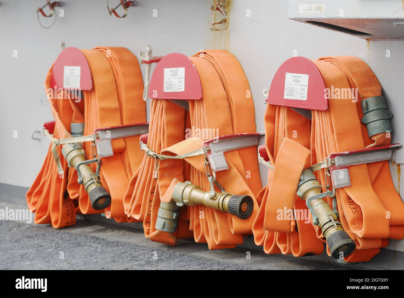 Deck hoses on destroyer boat Stock Photo Alamy