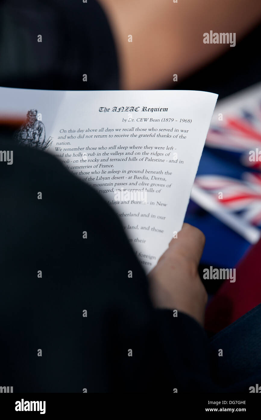 Child reading at ANZAC day memorial service Stock Photo