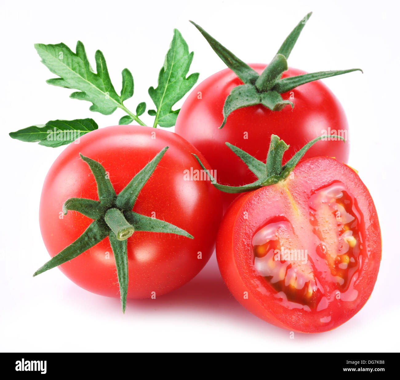Ripe tomatoes with green leaf isolated on a white background Stock ...