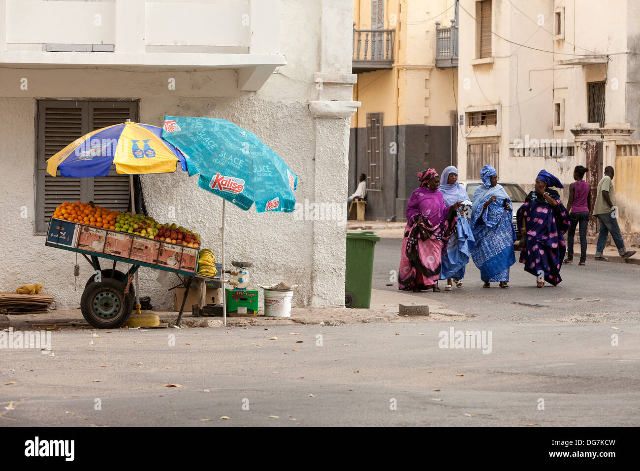 Senegal, Saint Louis. Women Walking and Talking. Stock Photo