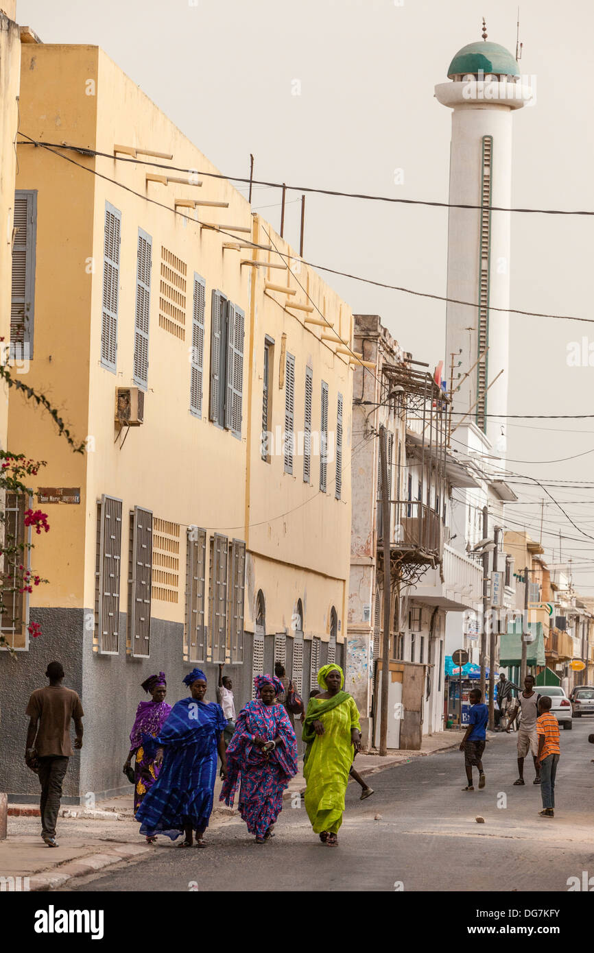 Senegal, Saint Louis. Street Scene, Women Walking. Stock Photo