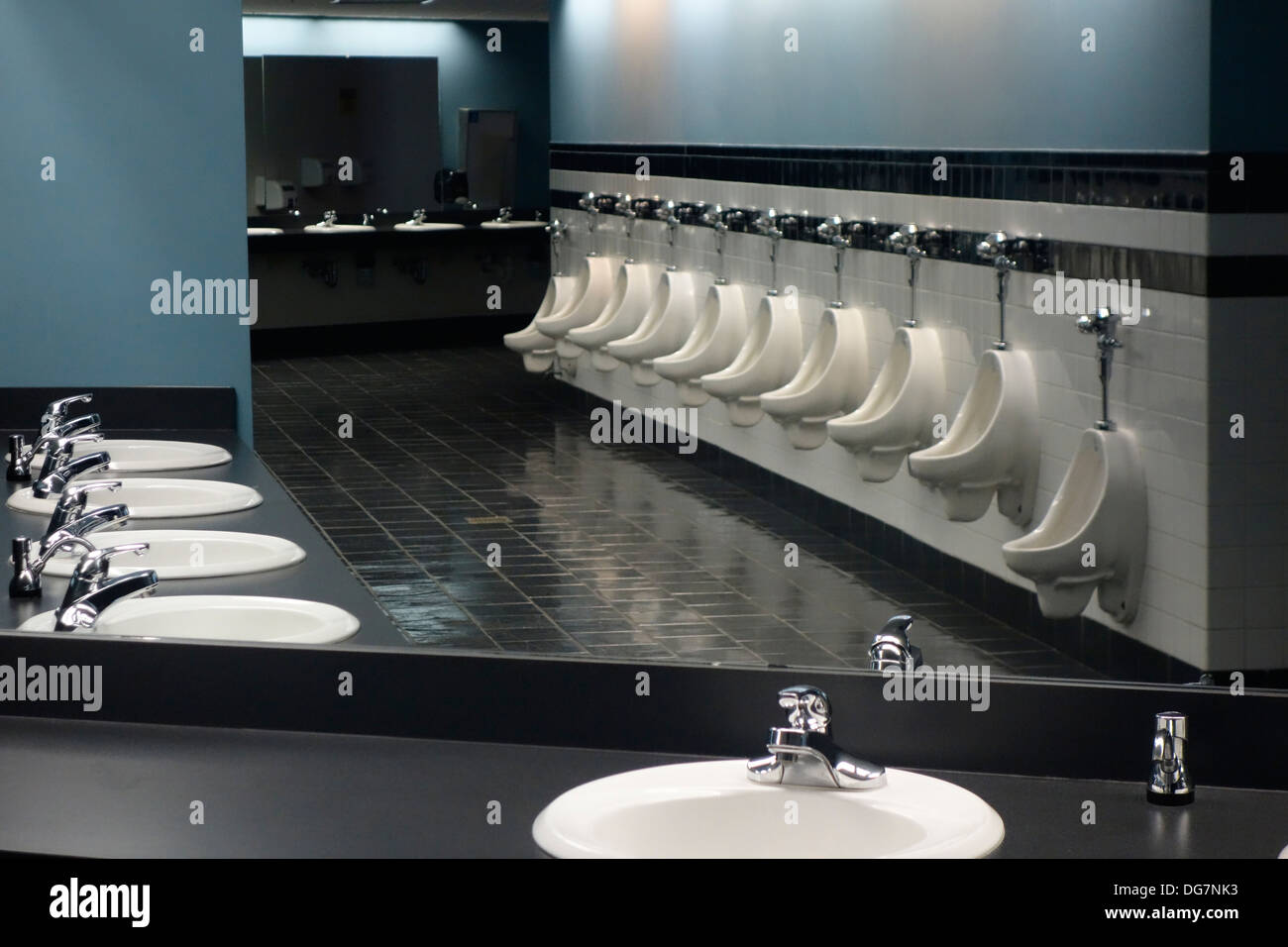 long row of urinals Stock Photo Alamy