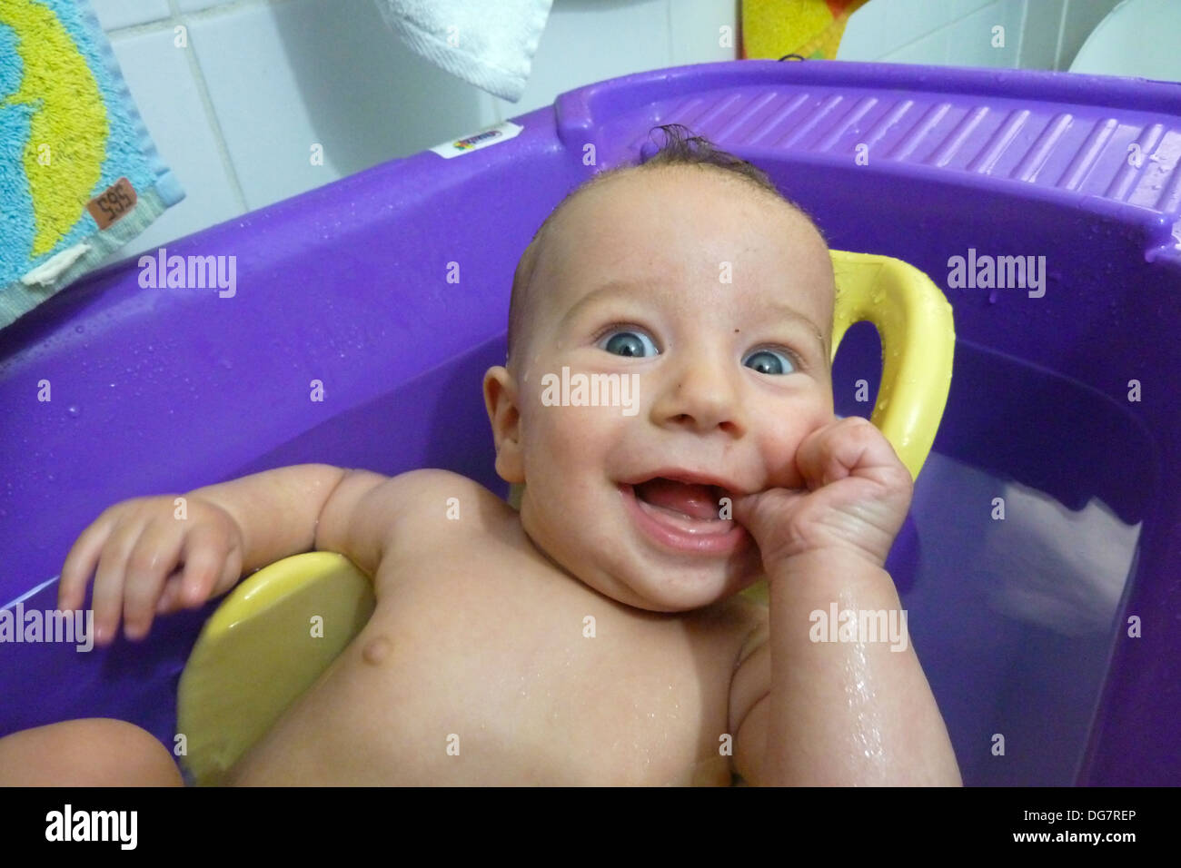 Three months old baby in the bath. Model release available Stock Photo Alamy